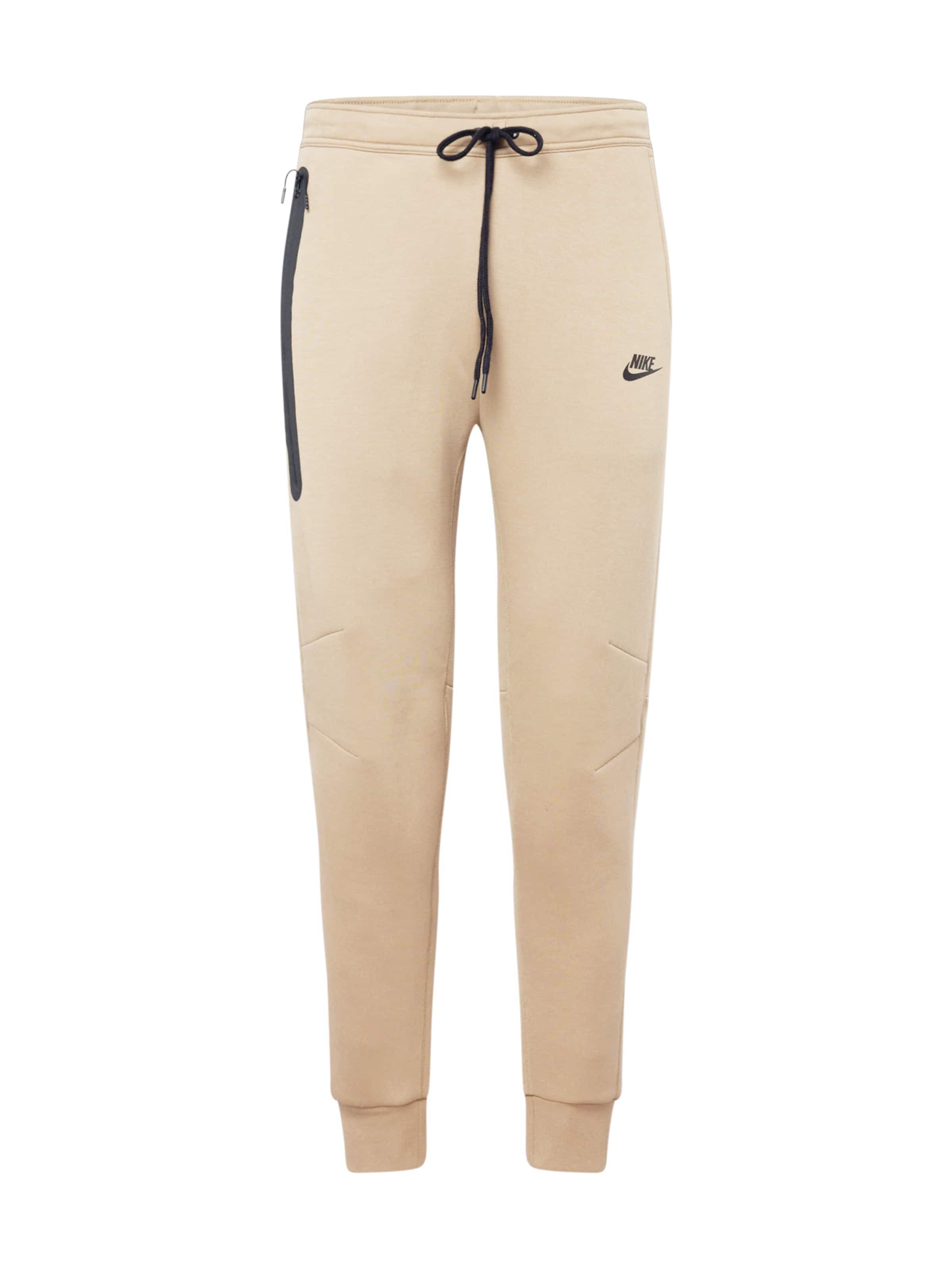 Nike Sportswear Tapered Sportsbukser 'Tech Fleece' i beige: forside
