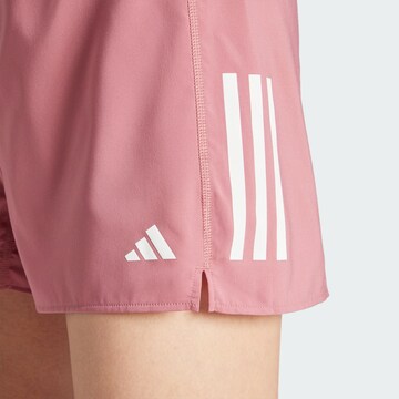 regular Pantaloni sportivi 'Own the Run' di ADIDAS PERFORMANCE in rosso