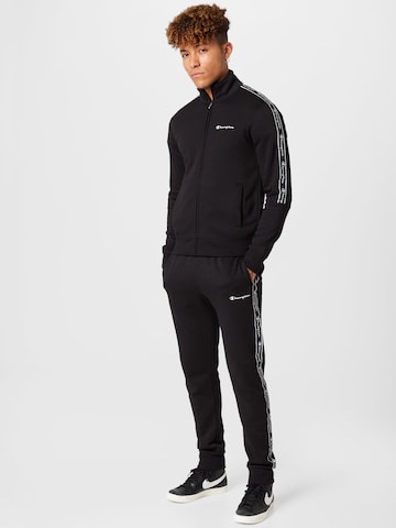 Champion Authentic Athletic Apparel Tracksuit in Black: front