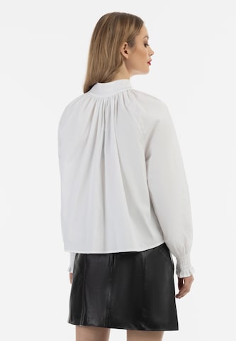 Camicia da donna di faina in bianco