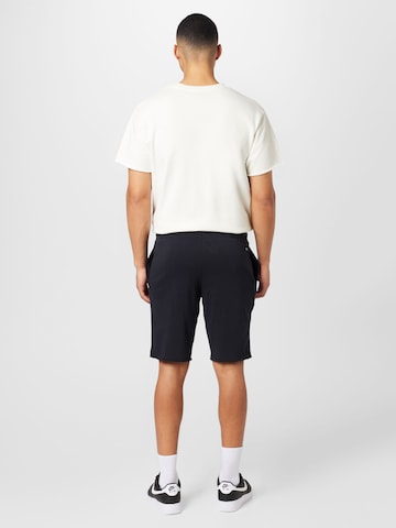 UNDER ARMOUR Tapered Sportbroek 'Project Rock' in Zwart