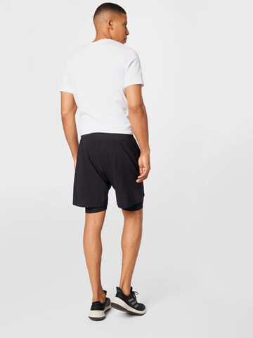 Reebok Regular Workout Pants in Black