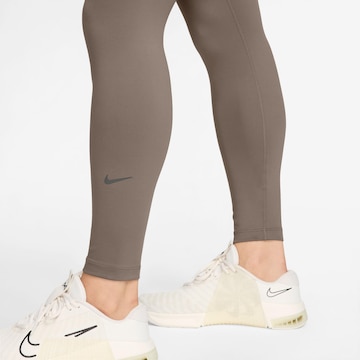 NIKE Skinny Workout Pants 'One' in Brown