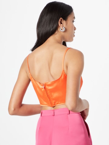 Top di Nasty Gal in arancione