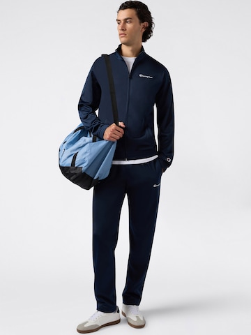 mėlyna Champion Authentic Athletic Apparel Treniruočių kostiumas: priekis