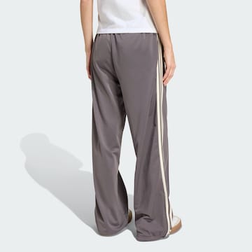 ADIDAS ORIGINALS - Loosefit Pantalón deportivo 'Firebird' en marrón