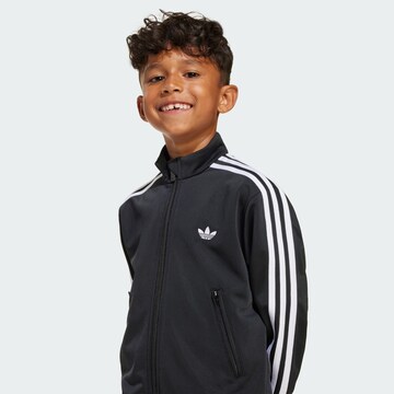 ADIDAS ORIGINALS - Ropa para correr 'Firebird' en negro