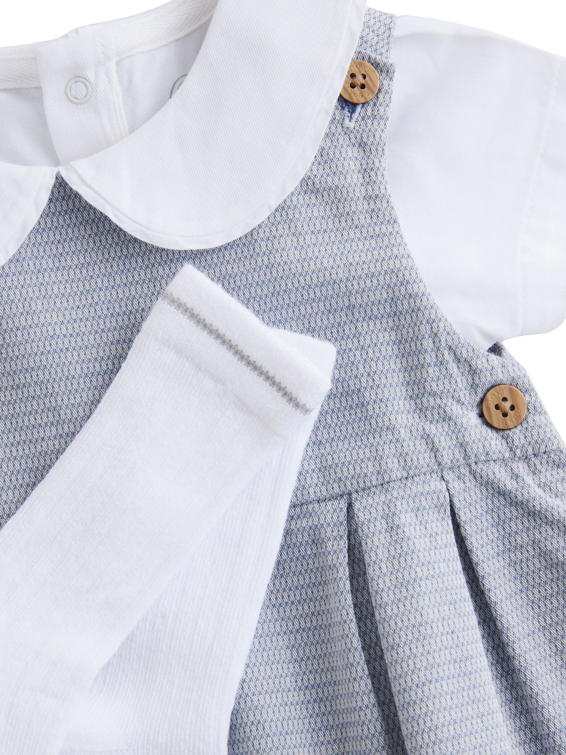 Next Strampler in Grau