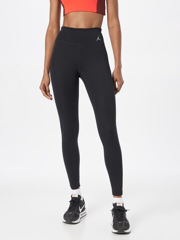 Skinny Leggings Jordan en noir : devant