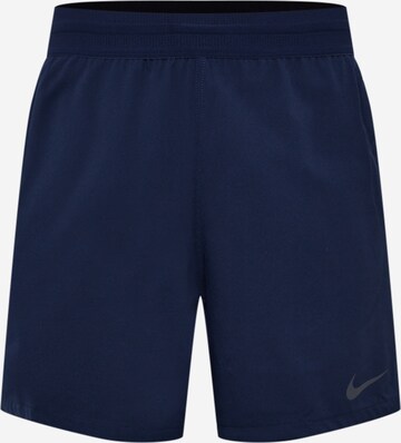 Pantalon de sport NIKE en bleu : devant