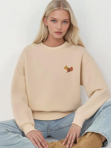 HiccupSweater majica 'Sweatshirts' - bež boja: prednji dio