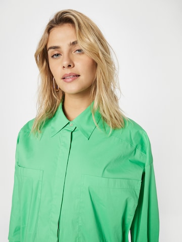 Camicia da donna di co'couture in verde