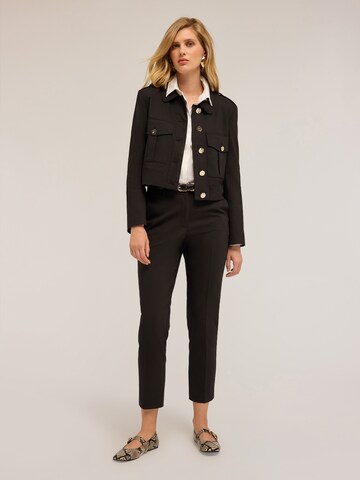 MOTIVI Between-season jacket in Black