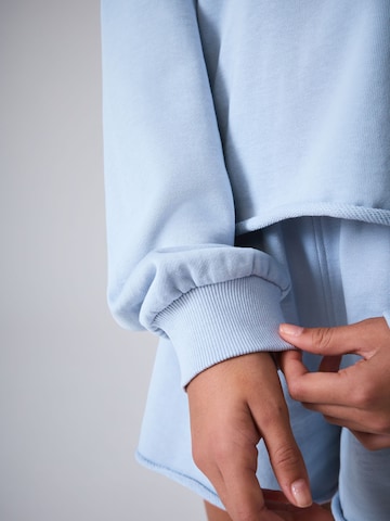 smALLSAINTS Juoksupuku värissä sininen