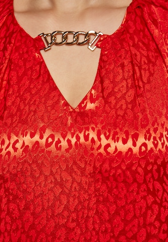 Camicia da donna di faina in rosso