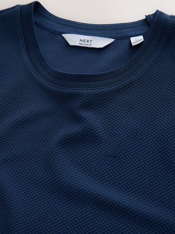 T-Shirt Next en bleu