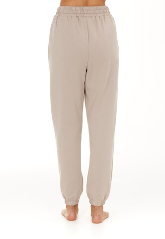 Athlecia Regular Workout Pants 'Aya' in Beige