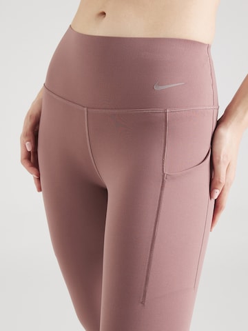 NIKE - regular Pantalón deportivo 'UNIVERSA' en marrón