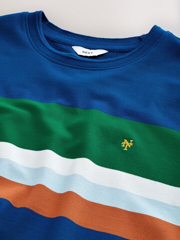T-Shirt Next en bleu