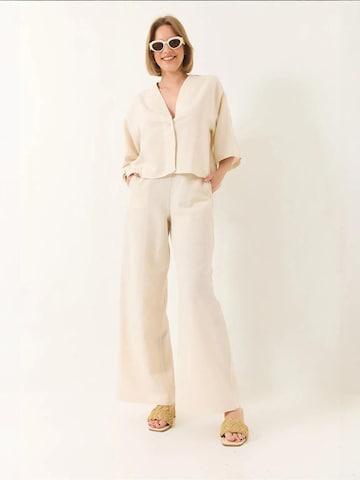 Completo pantalone di Bianco Lucci in beige: frontale