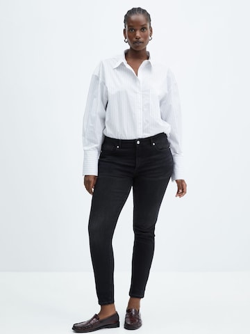 Skinny Jeans de la MANGO pe negru