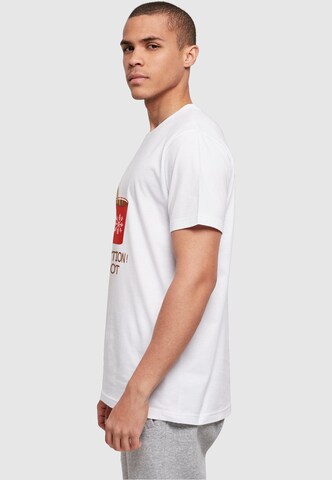 T-Shirt 'Caution Hot' Merchcode en blanc