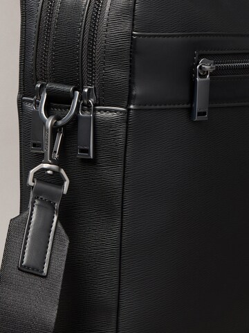 Sac d’ordinateur portable Calvin Klein en noir
