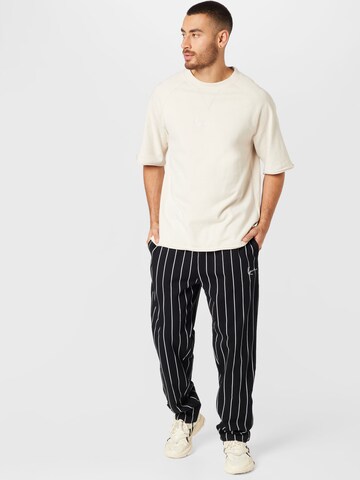 Karl Kani Loose fit Pants in Black