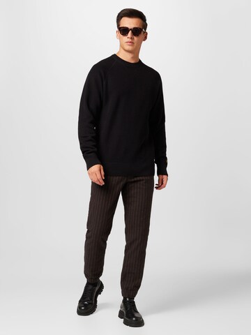 Carhartt WIP - Jersey en negro