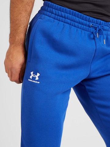 UNDER ARMOUR Tapered Sportbroek 'Essential' in Blauw