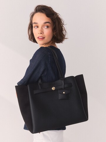 Next Shopper i sort
