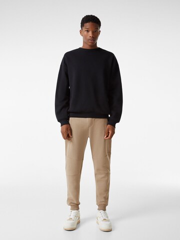 Bershka Tapered Broek in Beige