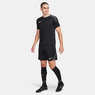 NIKE Regular Sportshorts 'Strike' in Schwarz