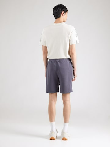 PUMA Regular Workout Pants 'Tad Essentials' in Grey: back