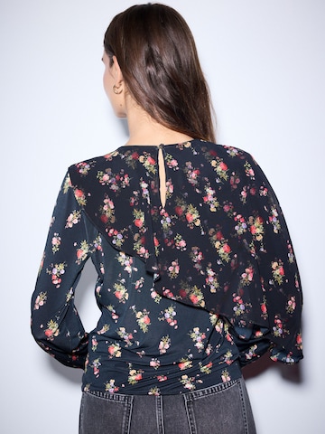 Next - Blusa en negro
