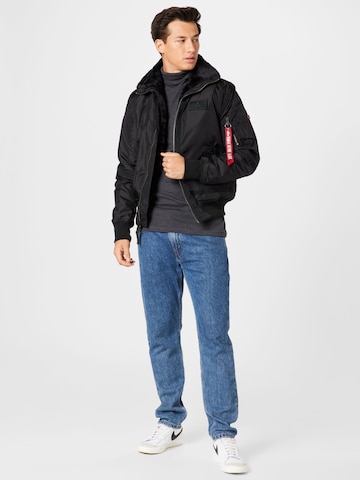 ALPHA INDUSTRIES Regular fit Tussenjas in Zwart