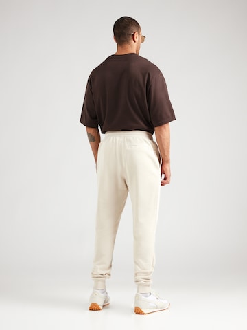 TOMMY HILFIGER Tapered Παντελόνι 'ESSENTIAL' σε μπεζ