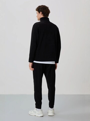 Regular Pantalon Tommy Life en noir