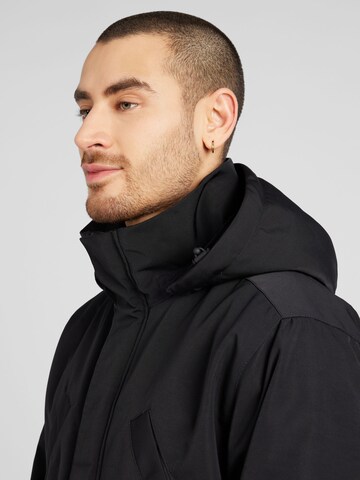 Embassy of Bricks and Logs Between-Season Jacket 'Hondo' in Black