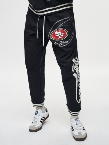 Tapered Pantaloni sportivi 'NFL 49ERS Go Niner' di Recovered in nero