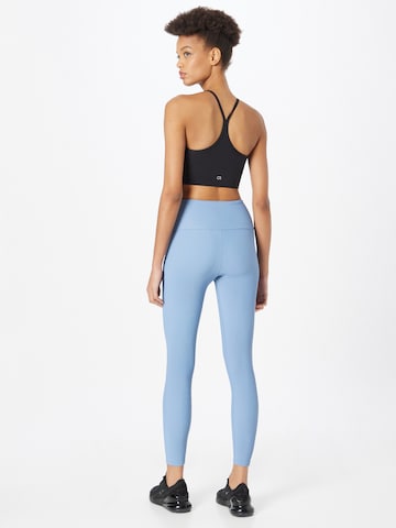 Onzie Skinny Leggings in Blau