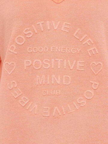 Zwillingsherz - Sudadera 'Positive Mind' en naranja