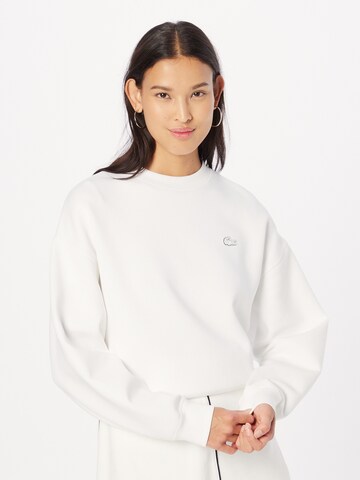 Sweat-shirt LACOSTE en blanc : devant