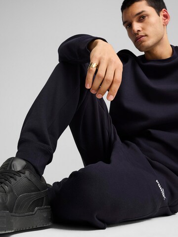 PUMA Конический (Tapered) Спортивные штаны 'ESS No. 1' в Синий