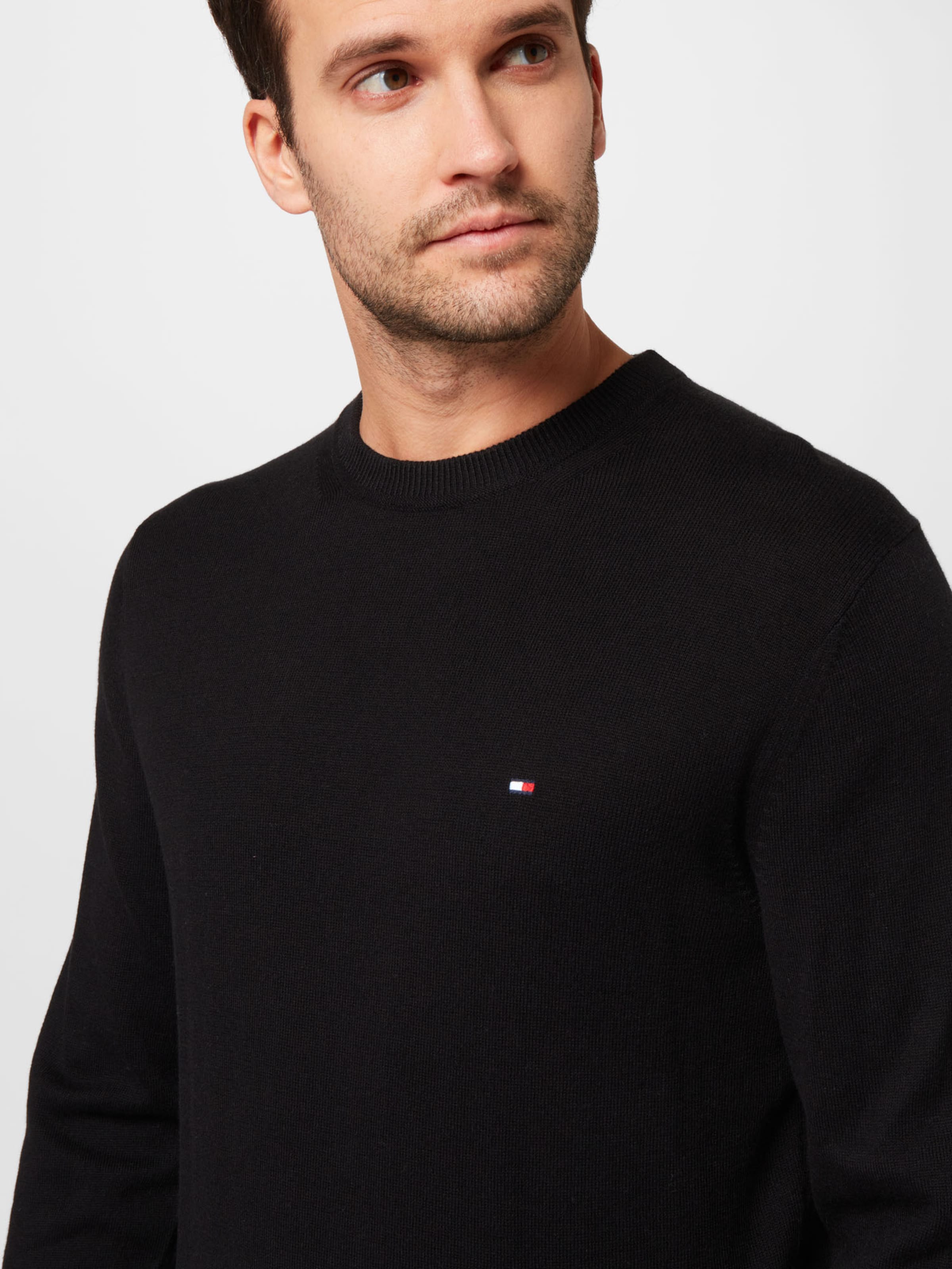 TOMMY HILFIGER Sweater in Black ABOUT YOU