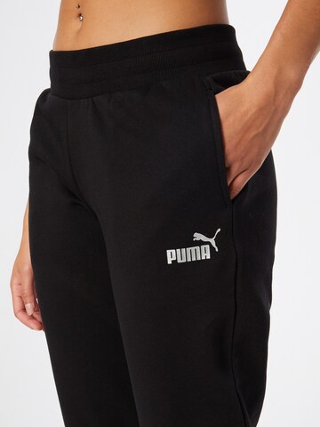 Tapered Pantaloni sport de la PUMA pe negru