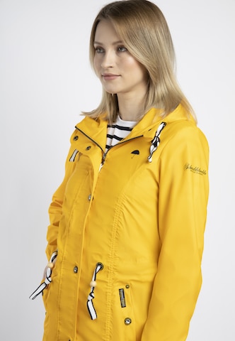 Manteau fonctionnel Schmuddelwedda en jaune