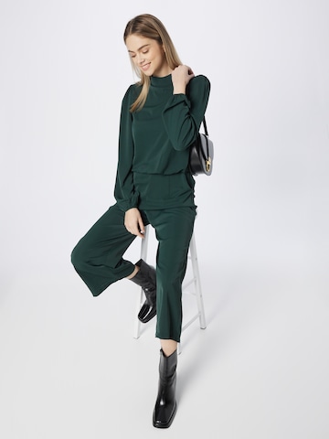 Tuta jumpsuit di AX Paris in verde