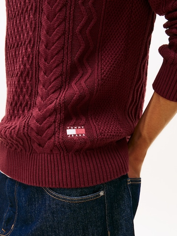 Pull-over Tommy Jeans en rouge