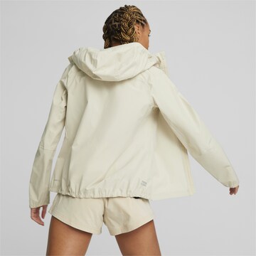 PUMA Sportjacke in Beige